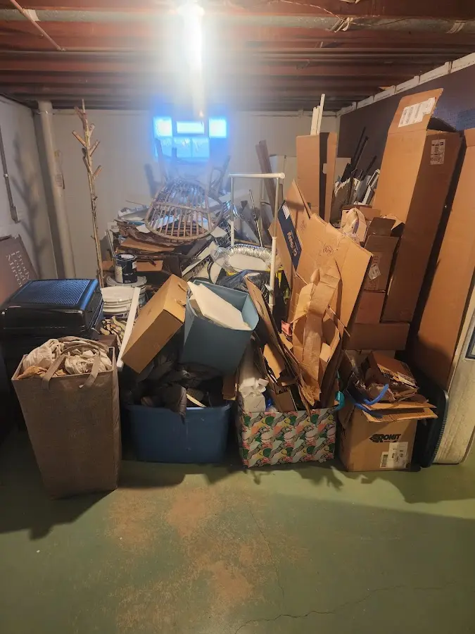 Roll-off dumpster container at job site for 2 Yard Dumpster Rental in Blackstone